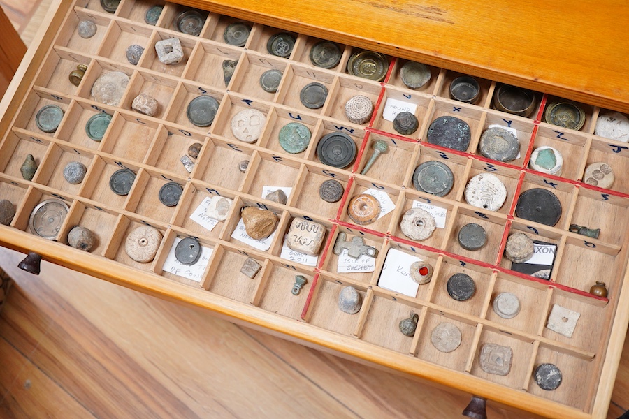 A collection of mainly Medieval to 19th century bronze and lead imperial circular trade weights, with some Viking and Roman examples, stamped with Royal Cyphers, weights, the dagger assay mark for London, the ewer mark,